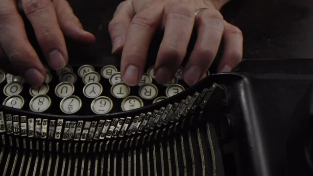 Typing on a Vintage Typewriter Close Up