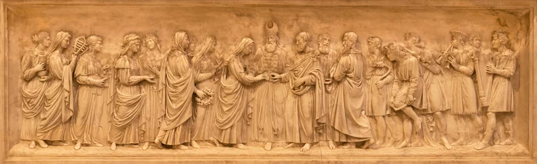 Foto op Canvas VICENZA, ITALY - NOVEMBER 7, 2023: The marble relief of Wedding of Virgin Mary and St. Joseph  on the menza in the church Chiesa di Santo Stefano by unknown artist. © Renáta Sedmáková