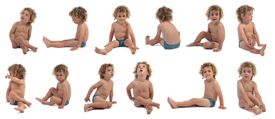 group of same  boy in underpants sitting on the floor on white background (3 year old)