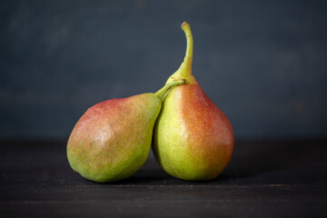 pears on a wooden table. still life photography