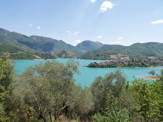 Panorama of Lake Turano with the two towns overlooking the coast, Rieti, Italy - 697023290