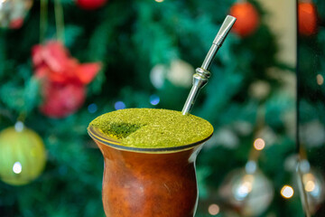 Traditional chimarrão prepared with amate herb (Ilex paraguariensis) in a Christmas atmosphere
