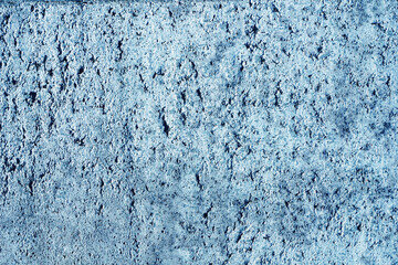 Fototapeta na wymiar Grunge cement wall. Concrete texture. Closeup stucco wall. Blue paint cracked background. Rough structure. Plaster closeup. Vintage macro backdrop.