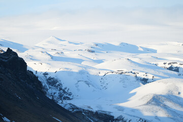 Fototapeta na wymiar Mountains at Myrdalsjökull in Southern Iceland in Winter 
