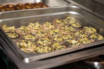 Mushroom delicacie appetizers are arranged in the serving dishes and ready to eat
