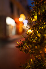 Christmas tree in a street with bokeh and shallow depth of field. - 697045039