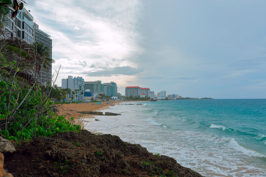 Condado beachfront shore in San Juan, Puerto Rico during an overcast day