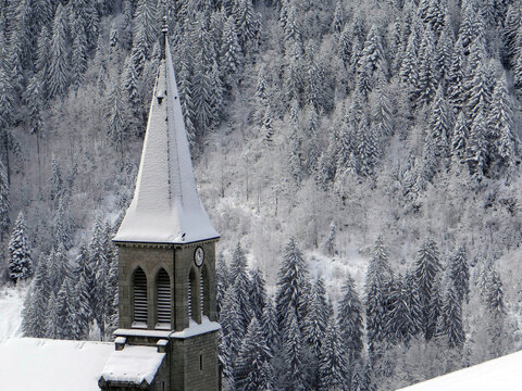Snow covered church steeple
