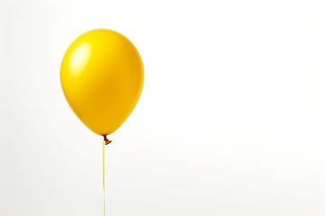 Contrast in focus Single yellow balloon contrasting beautifully on a white background, with space for customization.