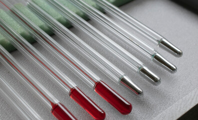 mercury thermometers, glass banks made of mercury.