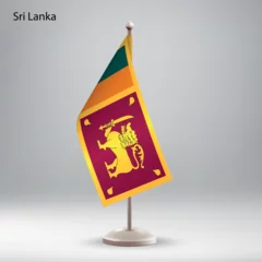 Foto op Aluminium Flag of Sri Lanka hanging on a flag stand. © Katyam1983