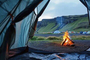 view from the tent to outside, firepit, camping 