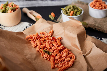 Natural healthy gluten free and carrot fusilli pasta. Organic healthy food for lactose intolerance