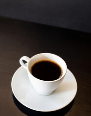 Fototapeta na wymiar cup of coffee on desk in office, modern lifestyle