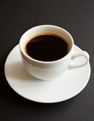 Fototapeta premium cup of coffee on desk in office, modern lifestyle