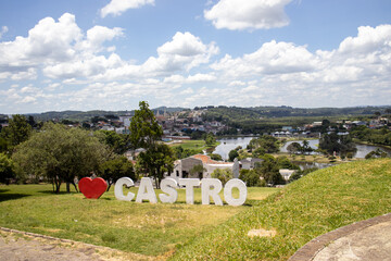 Castro Paraná Brazil Welcome sign at the top of the hill in the city of Castro with an aerial view in the background