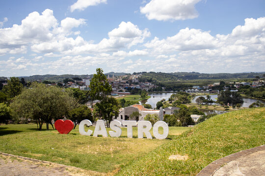 Castro Paran&aacute; Brazil Welcome sign at the top of the hill in the city of Castro with an aerial view in the background