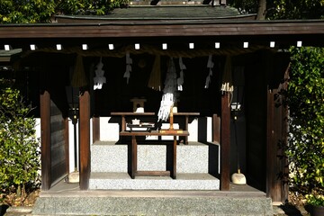The precincts of a Japanese shrine. There are over 100,000 shrines across Japan, which are...