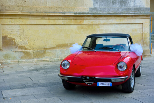 vintage alfa Romeo spider duetto wedding car September 23 2023 Lecce Italy	
