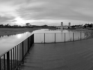 Puncak Alam, Selangor, Malaysia, November 10, 2022: Embracing Eco Grandeur: A Magnificent View of the Bridge, a Harmony of Nature, lake, Architecture in black and white.