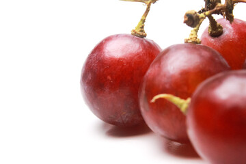 close up of isolated grapes on a white background