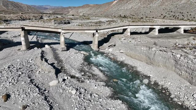 A Drone UAV View of a Bridge that Collapsed due to a Tropical Storm and Run Off with Erosion over a River