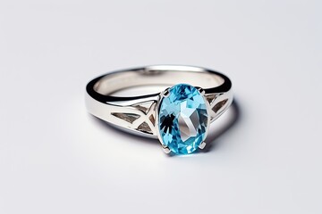 Handcrafted unique white gold ring with natural blue topaz gemstone