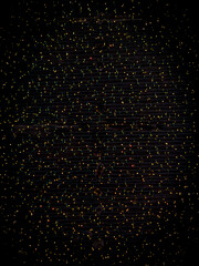 Christmas lights standing out in the midst of darkness