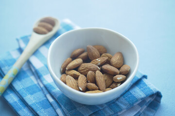 Close up of almond nut isolated on white 
