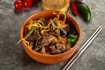 Asian wok with noodle, vegetables and beef