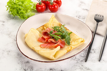Russian pancake with salmon fish