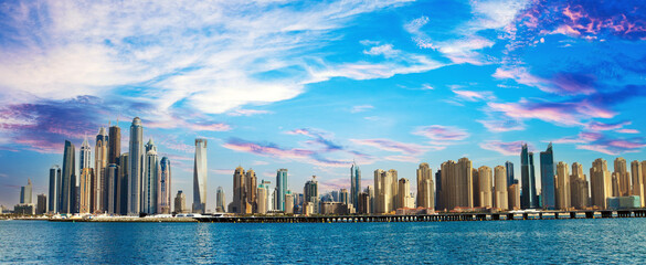 Obraz premium Dubai - The skyline of Downtown. Dubai - amazing city center skyline with luxury skyscrapers, United Arab Emirates