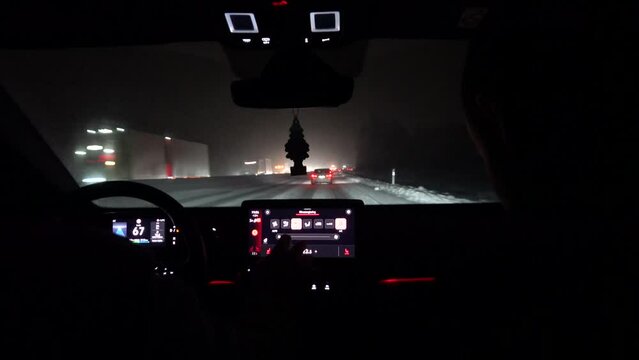 Norrkoping, Sweden The dashboard of a car driving through a severe snowstorm on the E4 highway. 