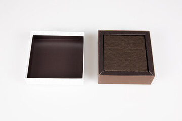 brown open chocolate Gift Box with cower in white background