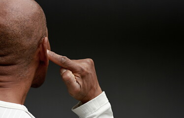deafness suffering from hearing loss on grey black background with people stock image stock photo	