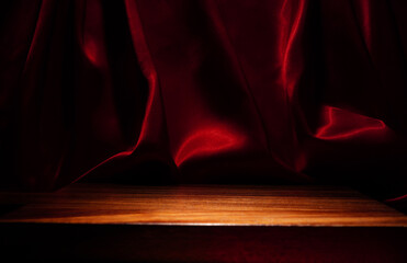 empty wooden floor Elegant wavy red cloth backdrop (Focus on a specific point)