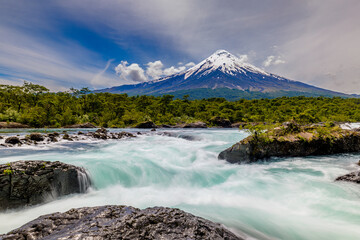 Petrohu&eacute; Waterfalls with snow-capped Osorno Volcano seen in the background, Vicente P&eacute;rez Rosales National Park, Lake District, Chile