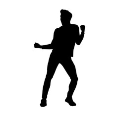 Fototapeta na wymiar Silhouette of a male dancer in action pose. Silhouette of a slim man in dancing pose.