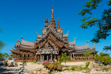 The Sanctuary of Truth wooden temple in Pattaya Thailand is a gigantic wooden construction located...
