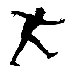 Silhouette of a male dancer in action pose. Silhouette of a slim man in dancing pose.