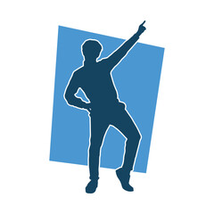 Silhouette of a male dancer in action pose. Silhouette of a slim man in dancing pose.