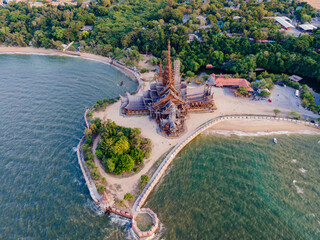 The Sanctuary of Truth wooden temple in Pattaya Thailand is a gigantic wooden construction located...