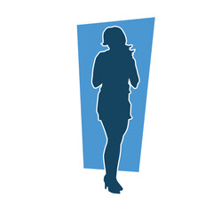 Silhouette of a slim fashionable female model in pose.