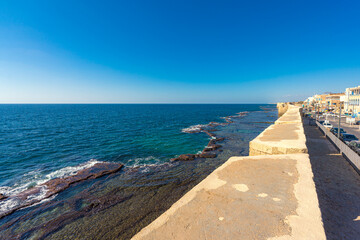 View of Acre City Walls facing the Mediterranean Sea on a sunny day