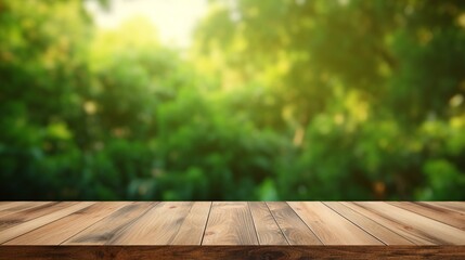 Table top made of empty wood with a blurred abstract green background from a house and garden. For product showcase montage