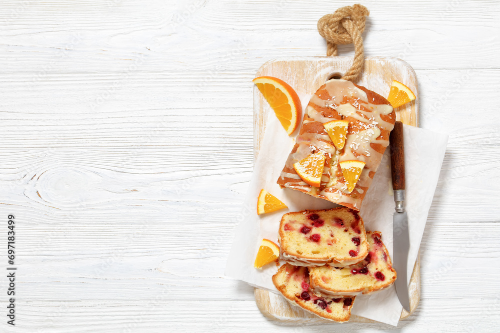 Poster orange cranberry loaf with orange glaze, top view