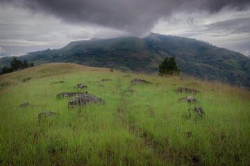 Clouds over the mountain (Pusuk Buhit Mt.) in Toba Samosir, Indonesia. 