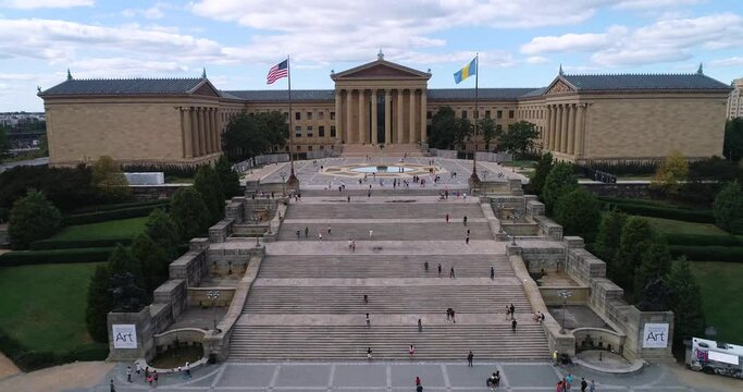 Philadelphia Museum of Art and Rocky Steps. Waving Flags in Background. 4k