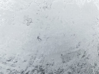 Top view, snow texture. Background, winter period. Natural background. The background is snow and ice. Close-up photo of frozen surface. December is the month. The first snow