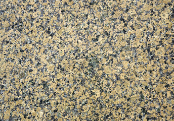 Red granite with black spots